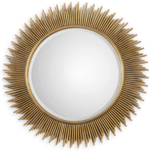 Uttermost Marlo round gold wall mirror with a sleek, modern frame, hanging on a stylish wall.