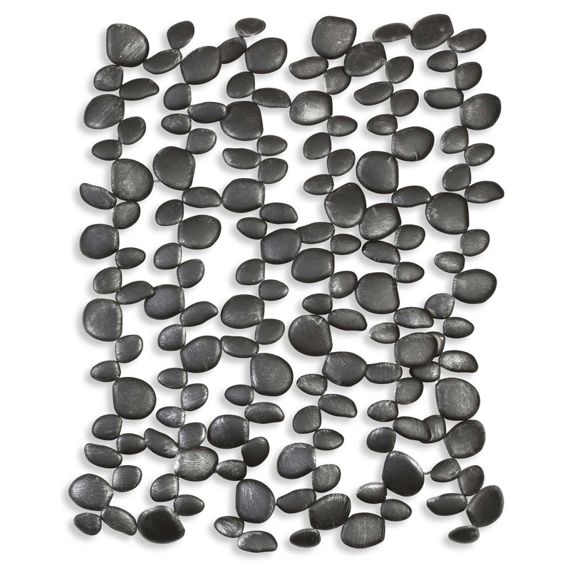 Uttermost black forged iron wall art featuring skipping stones design, perfect for modern home decor.