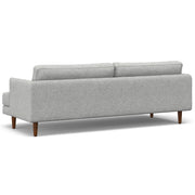 Livingston upholstered stationary sofa by Simpli-Home with plush fabric, wide armrests, and comfortable seating in a modern living room setting.