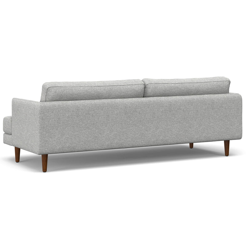 Livingston upholstered stationary sofa by Simpli-Home with plush fabric, wide armrests, and comfortable seating in a modern living room setting.
