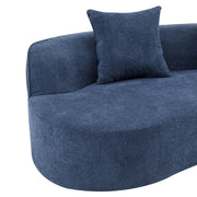 Elegant curved sectional sofa by Noble House with plush foam cushions, showcasing a stylish stationary sofa design.