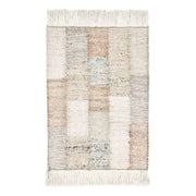 Classic Home Ritsa area rug with intricate patterns in neutral tones, perfect for adding warmth to living spaces.
