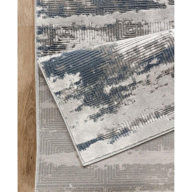 Geometrix - 5'3" X 7'3" Area Rug With Geometric 3D Effect - Gray / Ivory - R&R Furniture Gallery (Fountain Valley, CA)