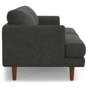 Livingston upholstered stationary sofa by Simpli-Home featuring plush fabric, cushioned armrests, and a modern design.