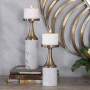 Set of two white and gold marble candleholders with elegant design, perfect for stylish home decor. Uttermost Castiel candleholders.