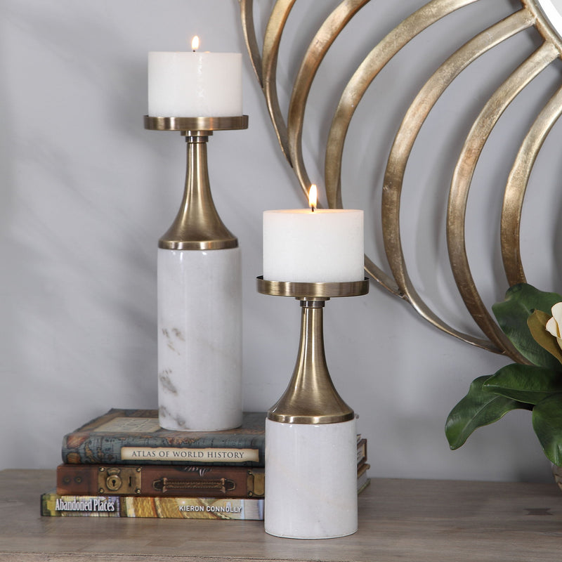 Set of two white and gold marble candleholders with elegant design, perfect for stylish home decor. Uttermost Castiel candleholders.