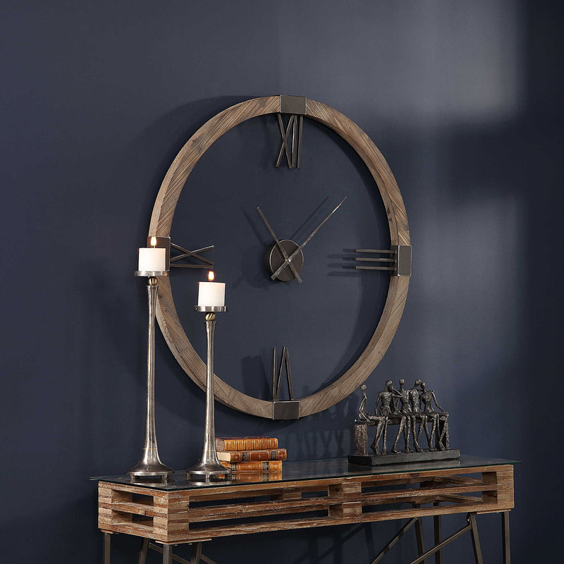 Modern light brown wall clock by Uttermost, featuring a sleek design and round face, ideal for contemporary home decor.