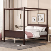 DreamHaus canopy platform bed with headboard, footboard, and slat support legs shown in a modern bedroom setting.