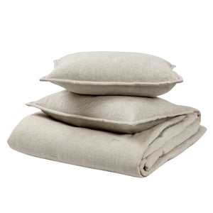 Classic Home Talia comforter set with a cozy, textured design in soft neutral tones on a neatly made bed.