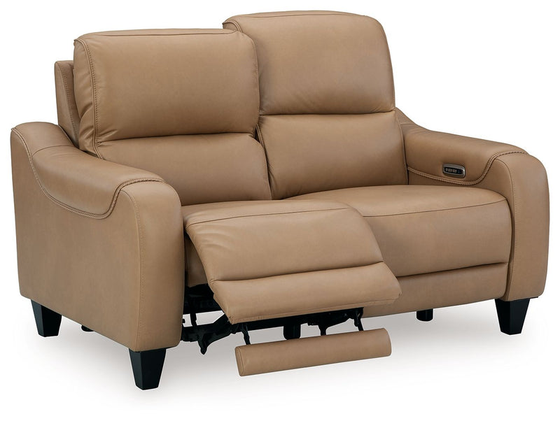 Ashley Mosswell power reclining loveseat in toffee with adjustable headrests, featuring plush cushions and a modern design.
