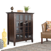 Handcrafted Acadian medium storage cabinet by Simpli-Home, featuring wooden accents and a functional accent cabinet design.