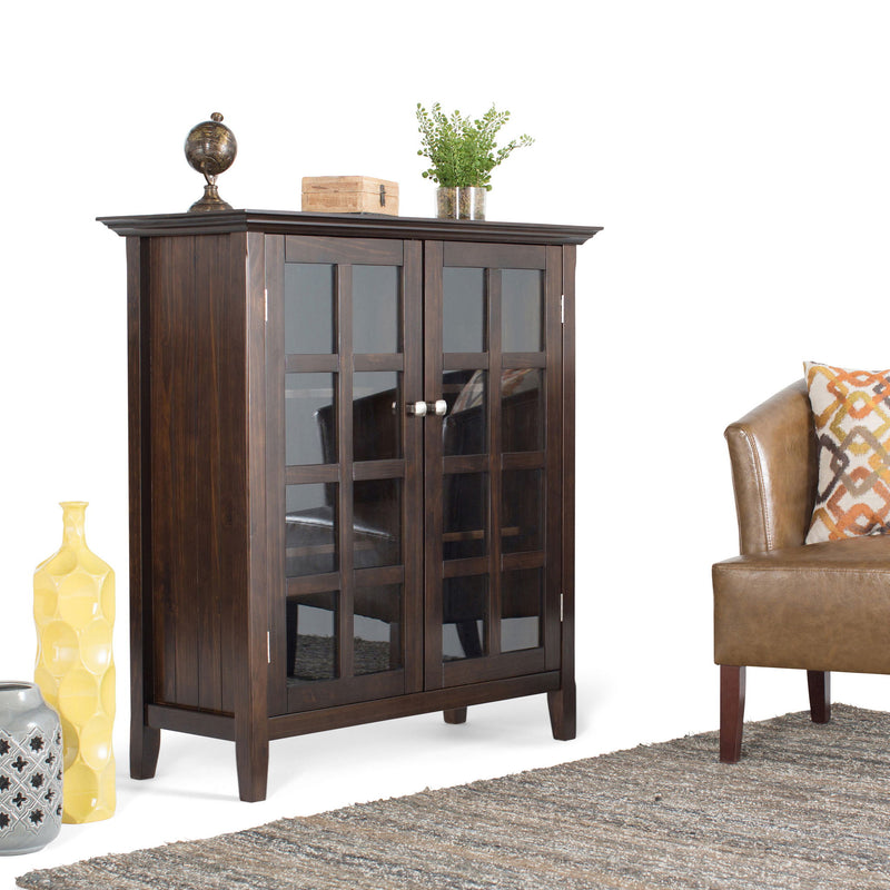 Handcrafted Acadian medium storage cabinet by Simpli-Home, featuring wooden accents and a functional accent cabinet design.