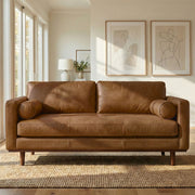 Simpli-Home Morrison upholstered stationary sofa with plush fabric and cushioned armrests in a modern living room setting.