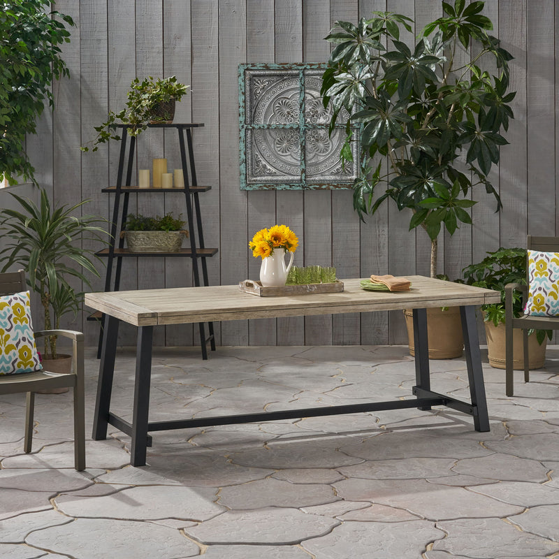 Noble House Equilibrium outdoor dining table with wooden frame and slat top, perfect for patio or backyard dining setups.