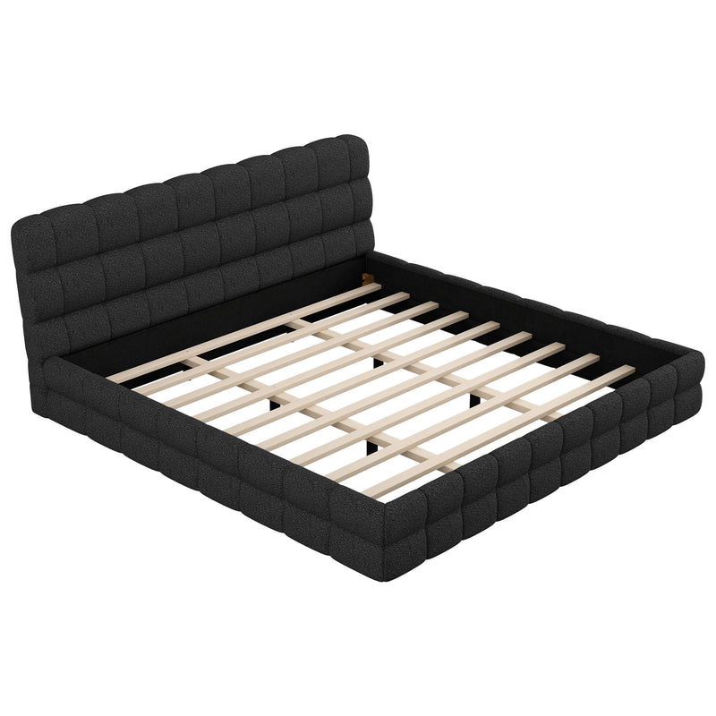 Dreamland upholstered platform bed with a padded headboard, featuring a modern design and soft fabric upholstery for a stylish bedroom.