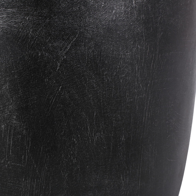 Outdoor lightweight concrete end table by Noble House with natural textured surface and matte black finish.