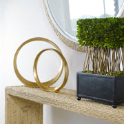 Pair of gold Jimena ring sculptures from Uttermost, featuring modern, minimalist design in a set of two decorative figurines.
