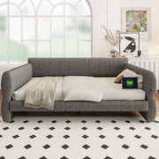 Dreamland upholstered storage platform bed with built-in USB charging ports, showcasing a modern design and plush fabric finish.