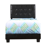 Upholstered Caldwell bed by Glory Furniture with a padded headboard and soft fabric upholstery in a modern bedroom setting.