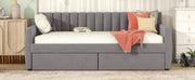 DreamHaus upholstered storage daybed with slat support, featuring a plush fabric headboard and spacious under-bed storage drawers.