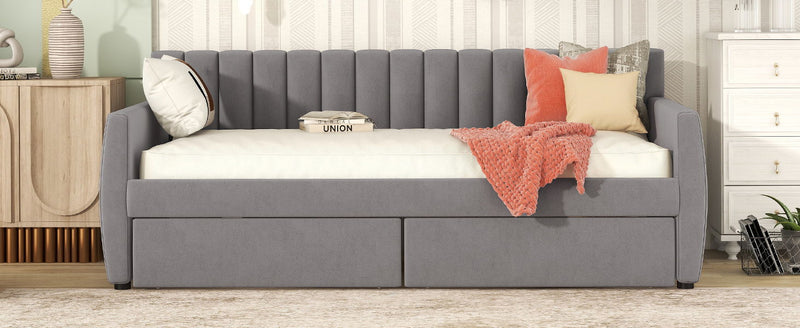 DreamHaus upholstered storage daybed with slat support, featuring a plush fabric headboard and spacious under-bed storage drawers.