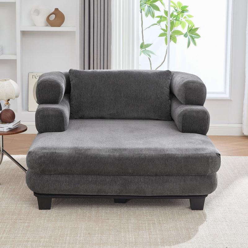 Noble House oversized chaise lounge sofa bed with deep seat and layered armrests, featuring plush upholstery and modern design.