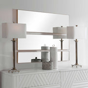 Set of three gold wall mirrors by Uttermost featuring sleek, modern frames perfect for stylish home decor.