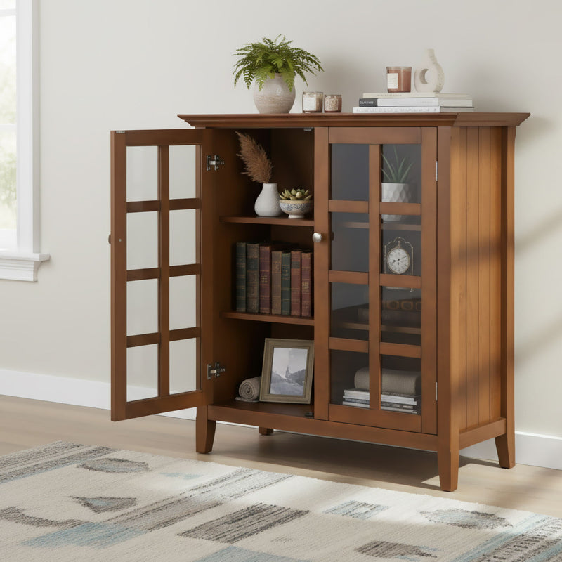 Handcrafted Acadian medium storage cabinet by Simpli-Home, featuring a natural wood finish and accent cabinet design.