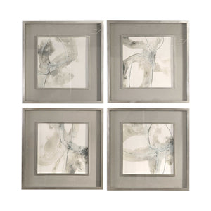 Set of four beige abstract art framed prints by Uttermost, featuring modern, minimalist designs for stylish wall decor.
