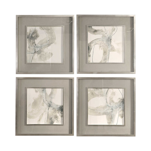 Set of four beige abstract art framed prints by Uttermost, featuring modern, minimalist designs for stylish wall decor.