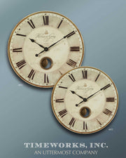 Uttermost Harrison Gray wall clock with a round metal frame and minimalist design, displaying black hour and minute hands.