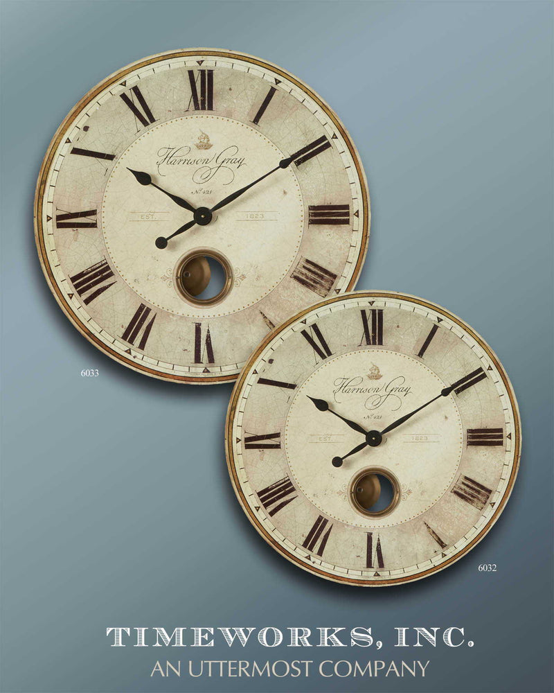 Uttermost Harrison Gray wall clock with a round metal frame and minimalist design, displaying black hour and minute hands.