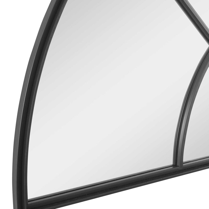 Black iron window arched mirror by Uttermost featuring a classic, elegant design with a curved frame and reflective glass surface.