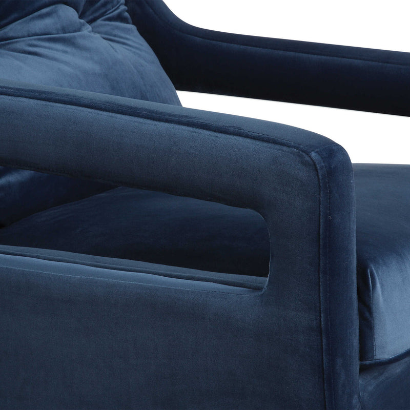 Uttermost O'Brien armchair with plush fabric, wooden legs, and a modern design perfect for living rooms and cozy spaces.