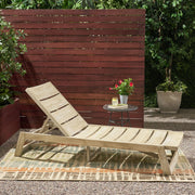 Noble House Maki chaise lounge with plush upholstery and sleek wooden legs, ideal for modern living room relaxation.