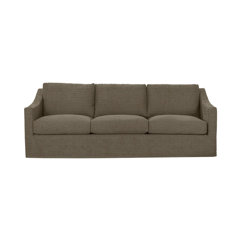 Classic Home Kipton upholstered stationary sofa with plush fabric, featuring wide armrests and comfy cushions in a stylish living room setting.