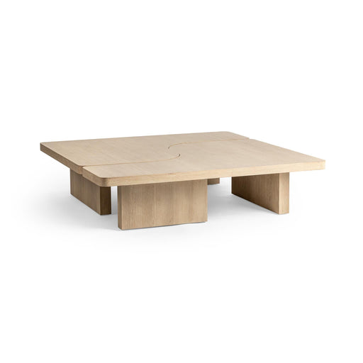 Classic Home Melina coffee table with a sleek wooden surface and modern design, displayed in a contemporary living room setting.