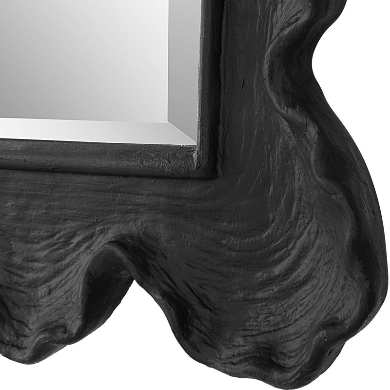 Uttermost Sea Coral wall mirror with a decorative frame inspired by ocean coral, ideal for coastal or beach-themed decor.