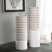 Pair of white Uttermost Angelou vases, set of 2, featuring sleek, modern ceramic design for stylish home decor.