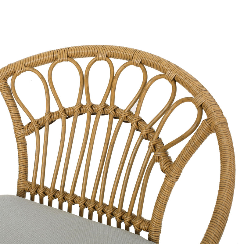 Set of two light brown Noble House Banya chairs with wooden frames and cushioned seats, shown from a side angle.