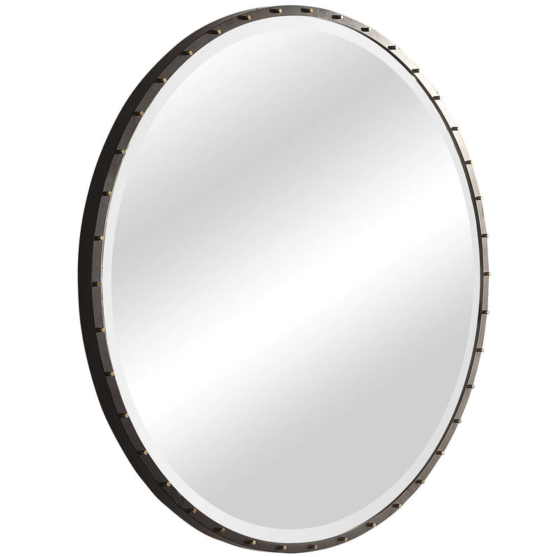 Black round wall mirror by Uttermost featuring a sleek, modern design with a simple black frame.