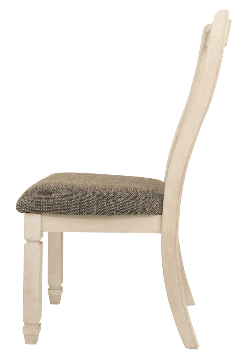 Set of two Bolanburg Signature Design Ashley dining UPH side chairs with rake back in brown and beige upholstery.