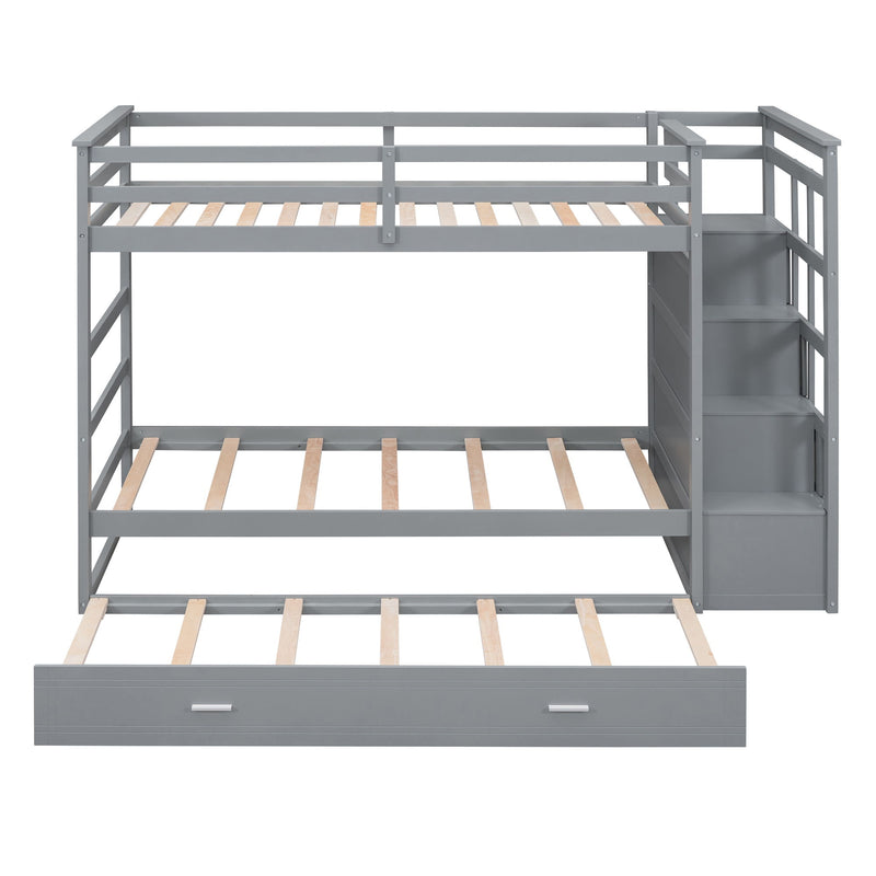 DreamHaus bunk bed with staircase and trundle, featuring twin beds, sturdy frame, and built-in storage in a modern bedroom setting.
