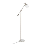 Lumi Source Marcel contemporary glam floor lamp with sleek metal finish and modern design, standing tall in a stylish living space.