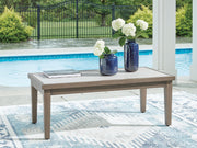 Rectangular brown and beige Rainier Ranch coffee table by Signature Design by Ashley® with a sleek, modern design and wooden finish.