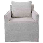 Gray Welland swivel chair by Uttermost featuring a modern design with a rounded back and cushioned seat.