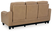 Ashley Mosswell power reclining sofa with adjustable headrest in toffee color, showcasing plush upholstery and reclining features.