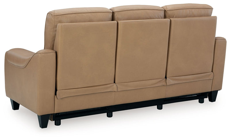Ashley Mosswell power reclining sofa with adjustable headrest in toffee color, showcasing plush upholstery and reclining features.