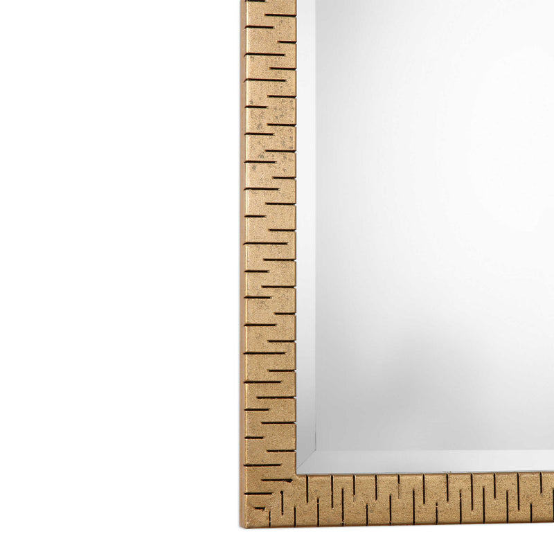 Gold metallic wall mirror by Uttermost, Vilmos style, featuring a sleek, modern design with a reflective surface and gold finish.