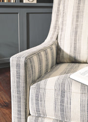 Kambria - Swivel Glider Accent Chair - R&R Furniture Gallery (Fountain Valley, CA)